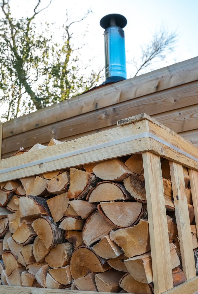 Kiln-dried logs crate close up