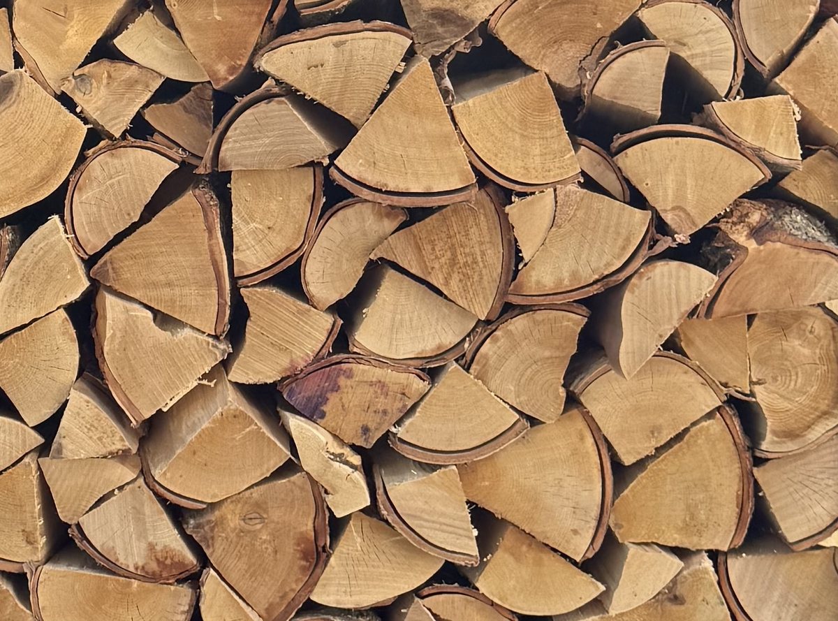 Close up of kiln-dried split logs